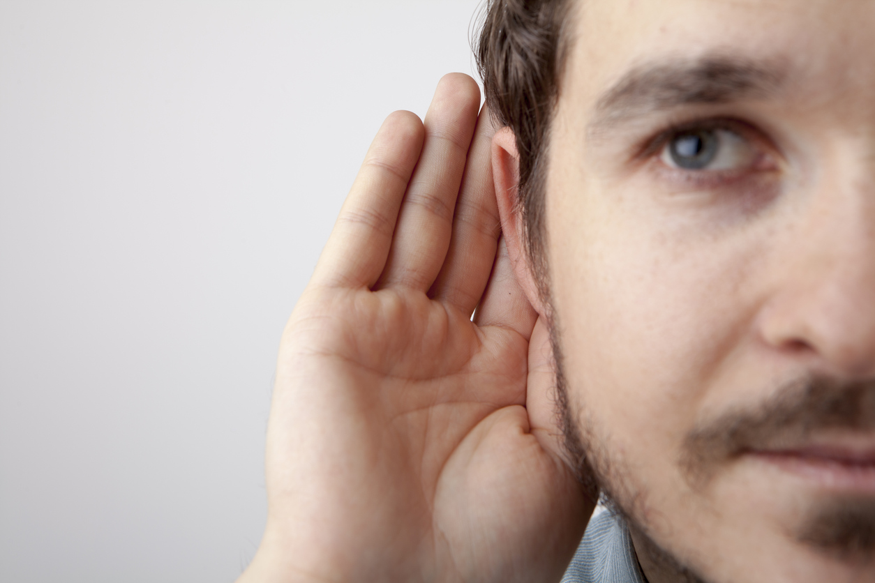 Man Trying to listen with right ear
