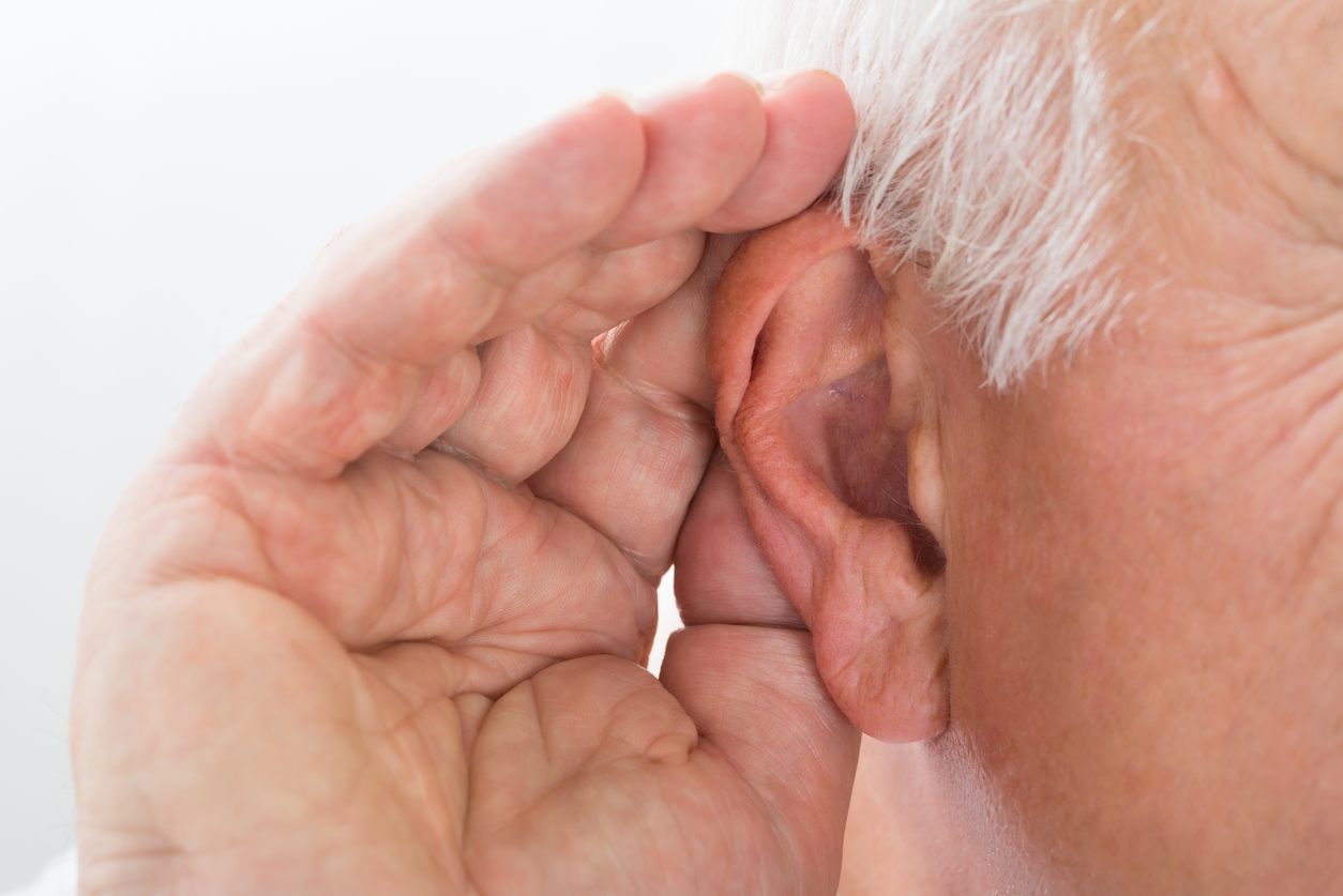 Older Gentleman trying to hear our of his right ear