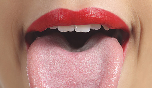 Woman sticking out her tongue