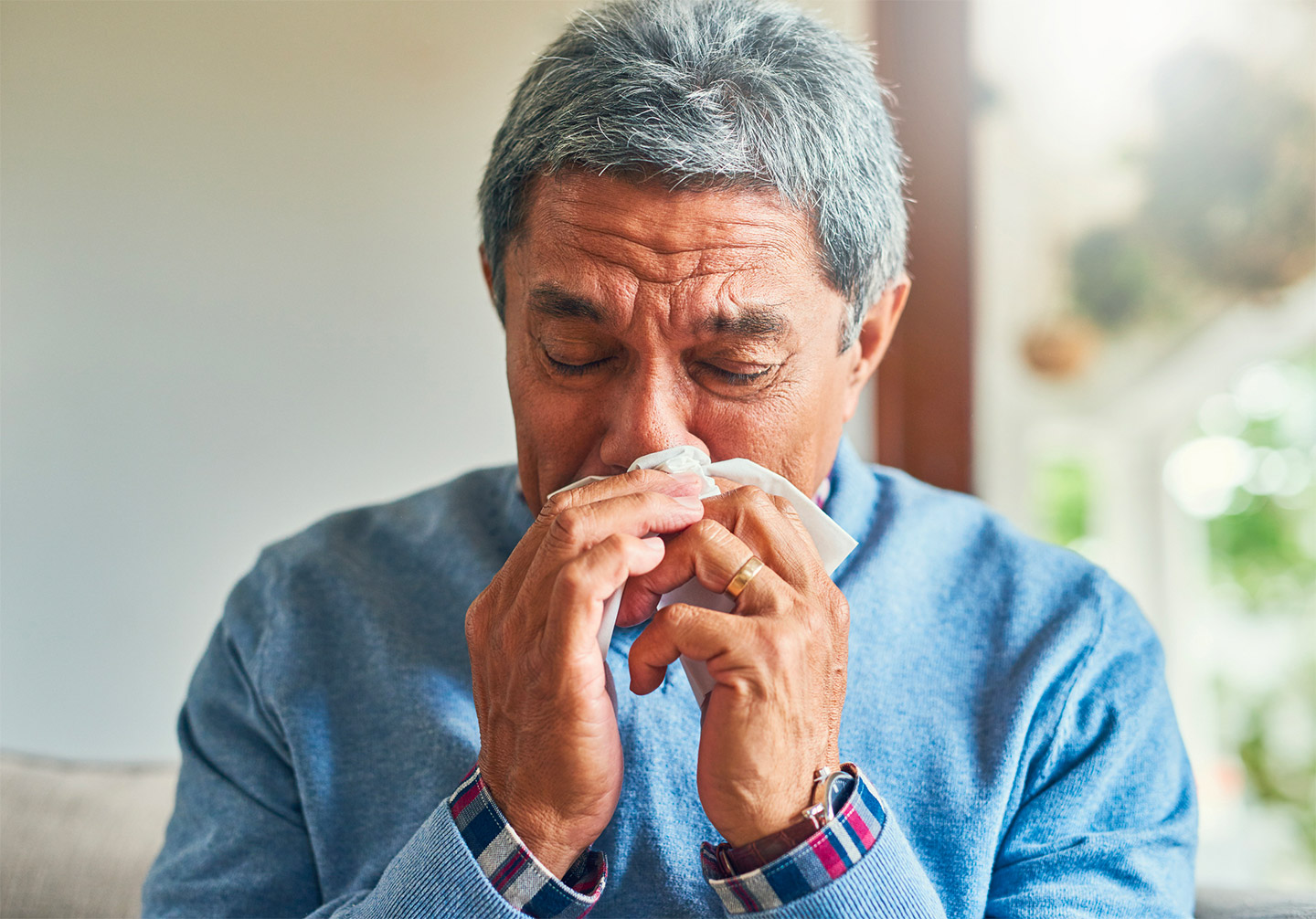 Older man with stuffy nose